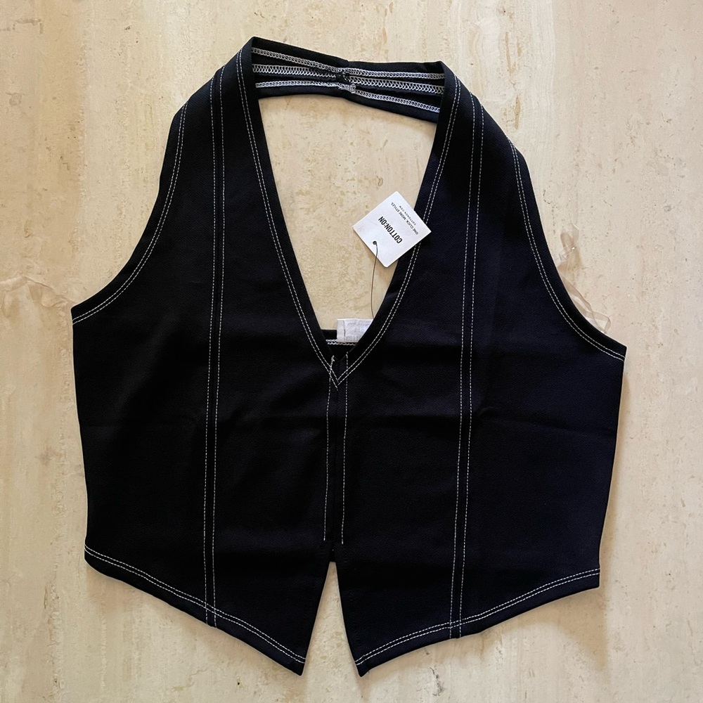Black cotton on halter top with white stitching